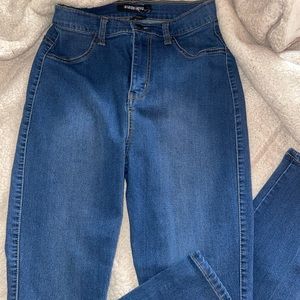 Classic High Waist Skinny Jeans -in medium blue wash no tag but brand new.